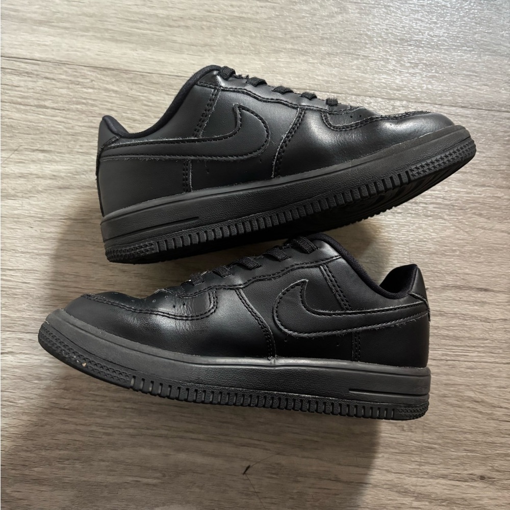 Nike All-Black Leather Sneakers